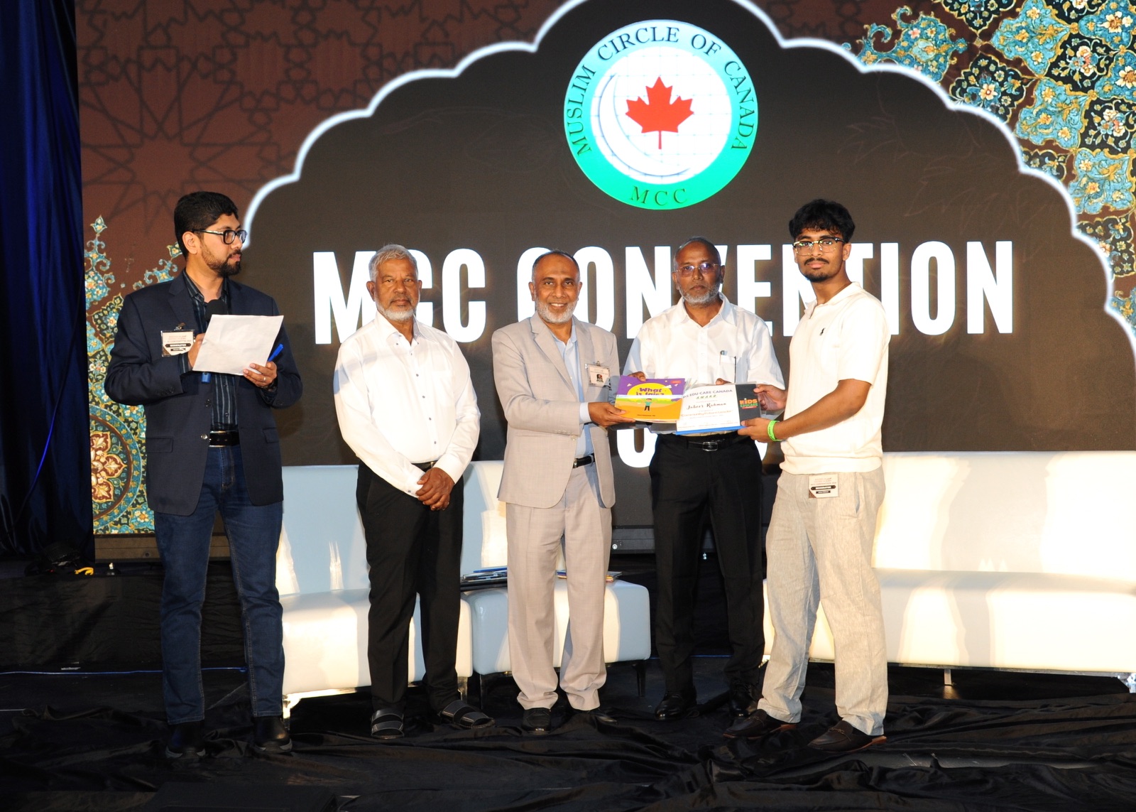 A youth is recognized with a book award