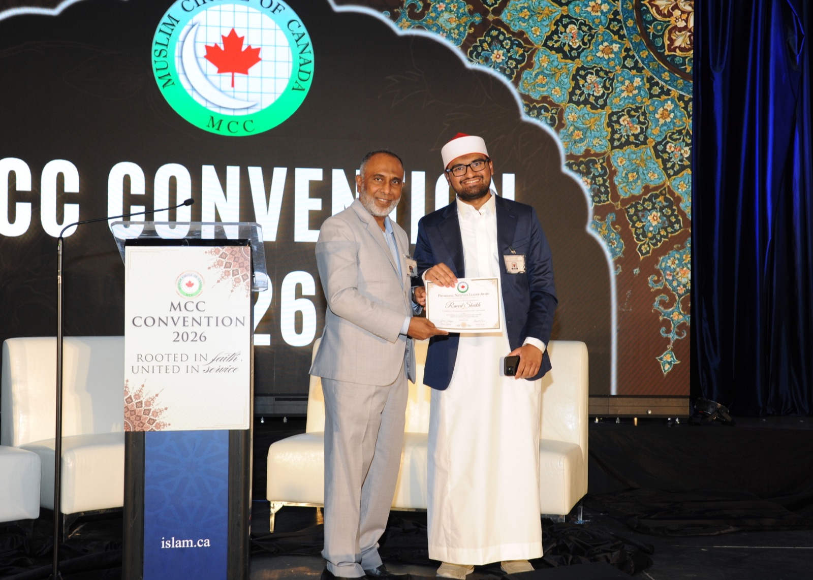 A Promising NextGen Leader award is presented on stage